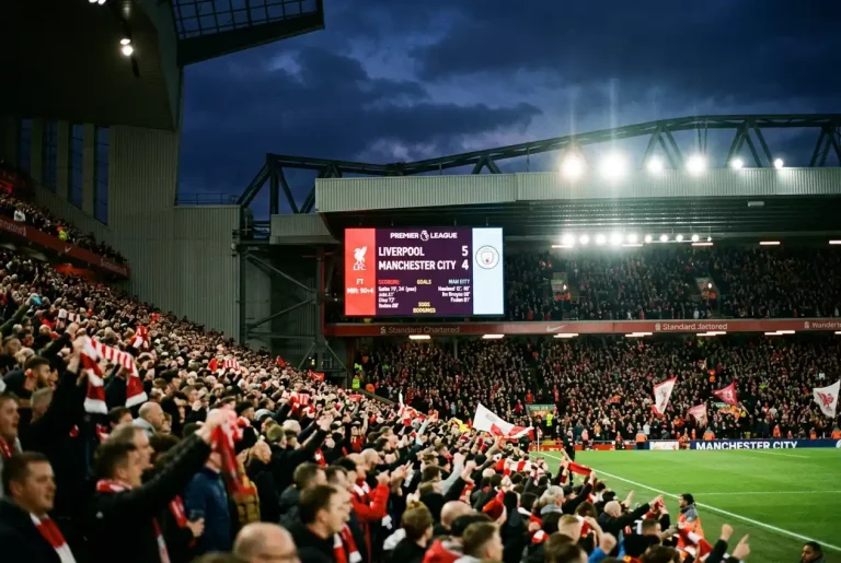 Tableau d'affichage d'un stade de Premier League montrant un score avec plusieurs buts